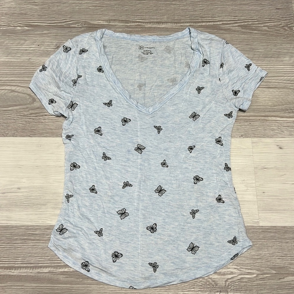 Butterfly top. Women’s size XS. Never worn. No tag.